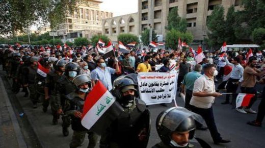 عراقيون يتجمعون في بغداد إحياء لذكرى الاحتجاجات المناهضة للحكومة
